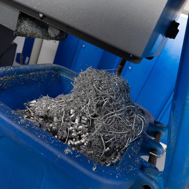 close-up-of-container-filled-with-metal-shavings-i-2023-11-27-04-56-30-utc